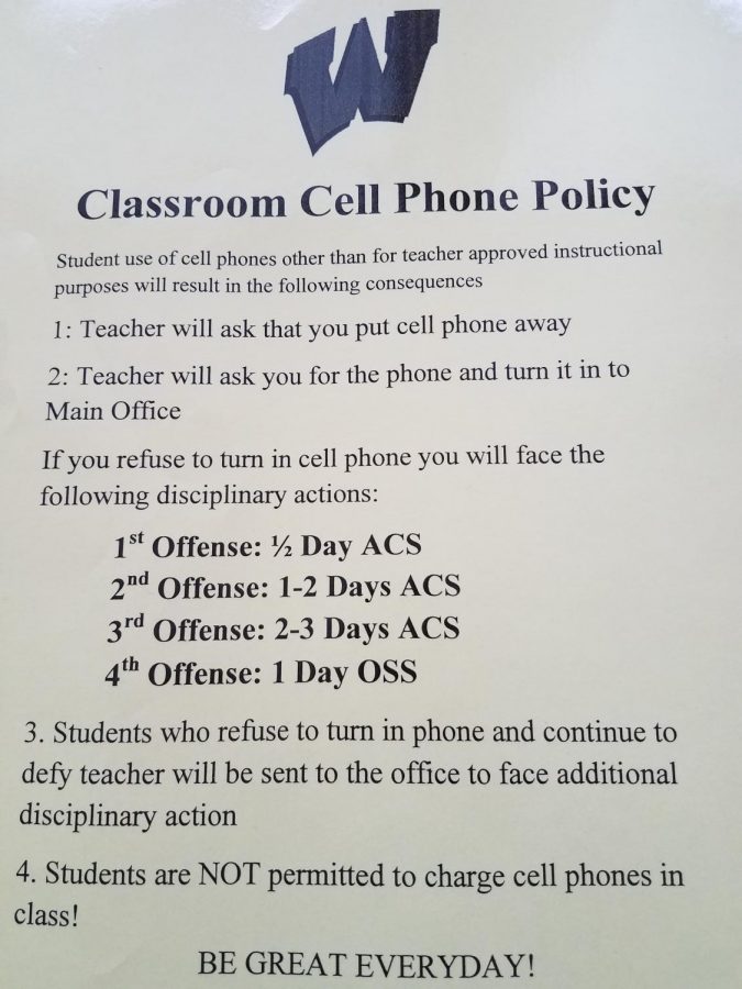All Woodbridge High School classrooms now have a flyer reminding students of the cell phone policy. 