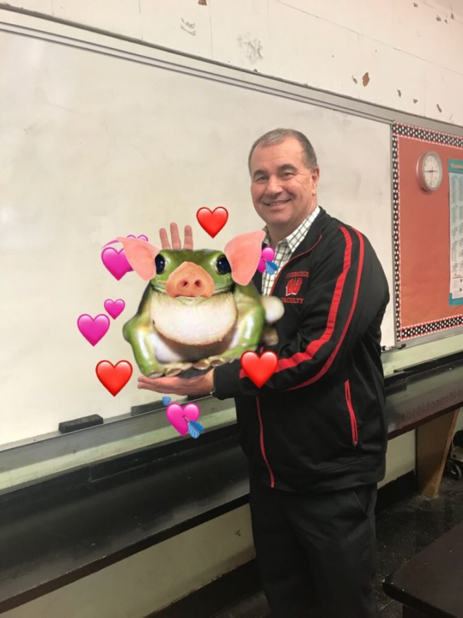 Mr. Picciano, biology teacher, introducing Frankfurt the prog to Woodbridge High School on March 15 shortly after his discovery. The prog’s popularity throughout the school resulted in a new mascot and apparel.