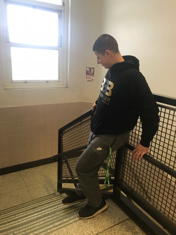 Junior John Jack Golden attempts to leave the third floor. A new rule was put in place forbidding students from going down the third floor stairs.