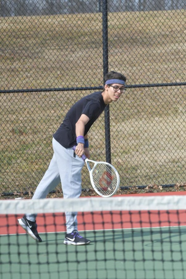 Ryan Silva practices before a big match against Spotswood. Ryan has enjoyed playing varsity tennis for the past three years.