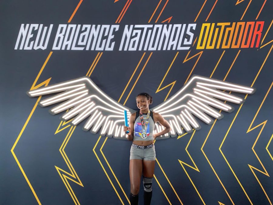Trinity Eason poses for pictures at New Balance Nationals moments before her race. She has competed in highly competitive races such as nationals and the UPENN relays.
