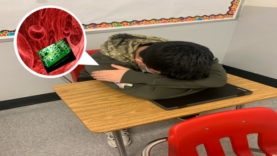 A senior, Angel Vega, laying on a Chromebook, charging it for a fellow student. After this, Angel charged the student ten dollars for the service. 