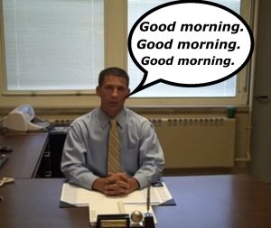 WHS principal Dr. Lottmann seen in his office, already stuck on the Good morning loop before students arrived. If trends continue, he will say Good morning to everyone in the school.