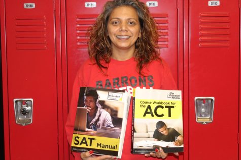 Ms. Johal holding ACT and SAT preparation books.