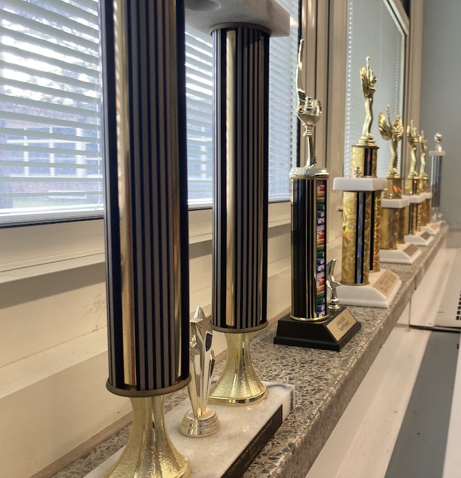Row of trophies won by the Academic Competition Team, WHS. 