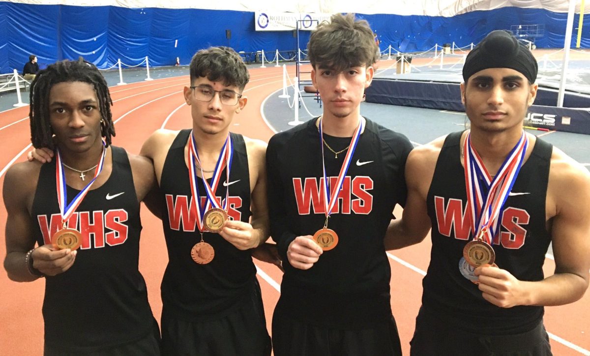 Members of the boys winter track team pose with their GMC Relay medals.

Photo Credit: @WHSTracknField