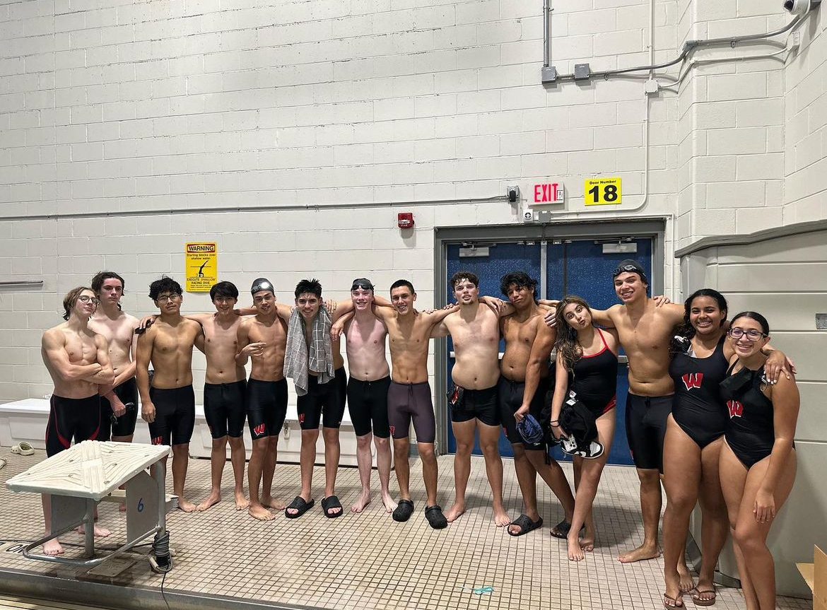 The swim team after their meet. A full team picture. 