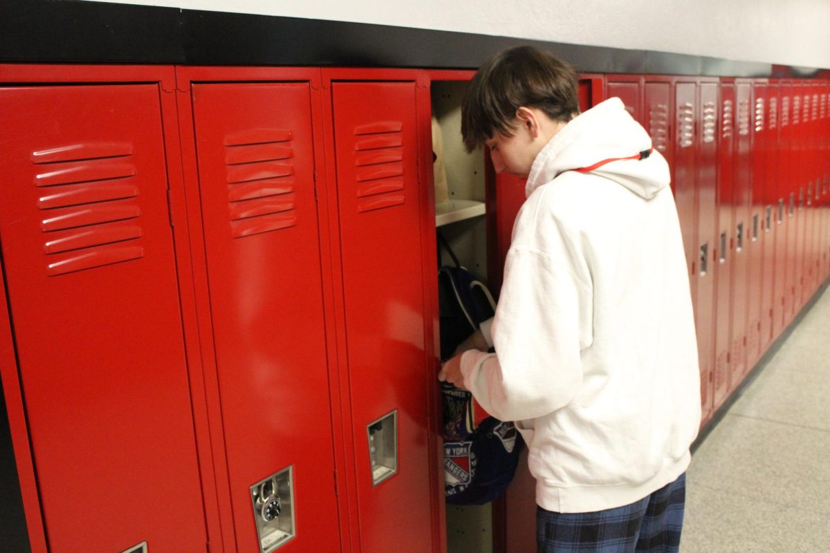 Photo of student using lockers