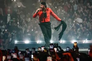 Bad Bunny performing live. Photo Credits: chicagomusicguide.com