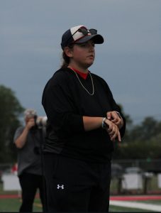 Ms. Fletcher coaching a girl’s soccer game. 

Photo Credit: @_brettayers_ on Instagram