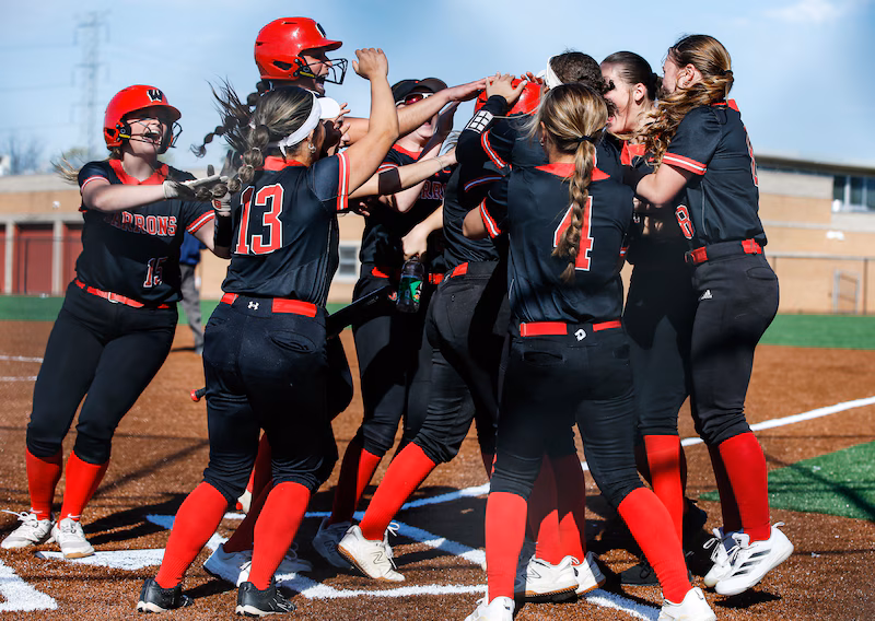 Barrons Softball celebrates at home plate

Photo Credit: Scott Faytok
